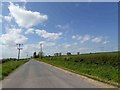 Power lines alongside a minor road near Lowthorpe