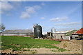 Farmyard with Grain Silo (black) and Grain Dryer (silver)