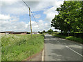 Road past Corner and Smallholding on the left