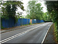 Blue hoarding on Barnet Lane