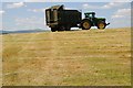 SO8843 : Tractor and silage trailer by Philip Halling