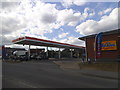 SU7367 : Esso filling station on Arborfield Road by David Howard