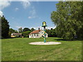 TM1383 : Burston Village sign on Church Green by Geographer