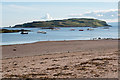 View over the sand in Millport Bay towards Little Cumbrae