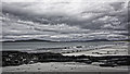 NF8880 : Rocks on the west beach on Berneray by Peter Moore