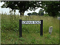 TM0385 : Lopham Road sign by Geographer