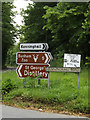 TM0082 : Roadsigns on Kenninghall Road by Geographer