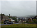 Looking down Dan Y Coed over the A487 towards the hospital