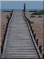 TR0916 : Dungeness: the boardwalk approaches the sea by Chris Downer