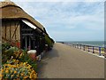 TV6197 : Thatched shelter on the lower promenade at the west end of Eastbourne by Steve  Fareham