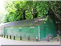 Green hut near the end of Mill Lane, EN10