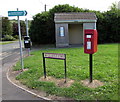 SN3710 : Postbox and bus shelter on a Ferryside corner by Jaggery