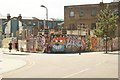 View of a wall of street art on the corner of Wallis and Prince Edward Roads