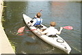 View of a pair of canoeists on the Hertford Union Canal