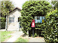 Telephone exchange, postbox and village noticeboard