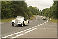 View of a second Lea-Francis 12 passing along London Road as part of the London-Southend Classic Car Run