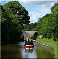 Narrowboat approaching Meaford Lock Bridge No 98