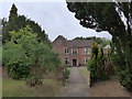 Looking from the churchyard towards the manor house