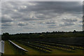 TL1751 : Field of solar panels by the railway line north of Sandy by Christopher Hilton