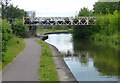 Disused railway bridge across the Trent & Mersey Canal