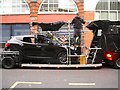 TQ3082 : Film crew preparing to shoot a scene in a car, King's Cross Road, London by Robin Stott