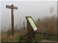 SP9313 : The map and signpost at the Visitor Centre, College Lake, on a foggy day by Chris Reynolds