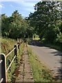 Road across the flood-plain at Lickfold Bridge