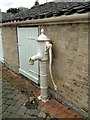 An old hand pump at Brinton Hall