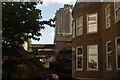 View of one of the Barbican Towers from the area near the underground car park near the Museum of London #2