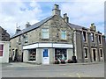 NJ5866 : Charity Shop, The Square, Portsoy by Stanley Howe