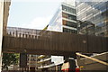 TQ3280 : View of the footbridge connecting the M&G building with the Nomura building from Upper Thames Street by Robert Lamb