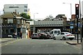 A railway bridge crosses Richmond Road