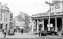 SP7560 : Northampton, 1956: corner of Drapery and George Row, outside All Saints Church by Ben Brooksbank
