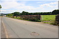 Minor road on north side of Carleton Hall Farm