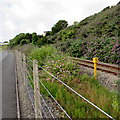 Quarter mile post alongside the West Wales Line SW of  Fishguard Harbour railway station