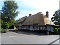 Cottage undergoing re-thatching