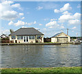 TG4117 : Bungalow and boat shed beside the River Thurne by Evelyn Simak