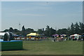 View of a wind turbine in Dagenham Ford and the Littlebrook Power Station chimney from Old Dagenham Park