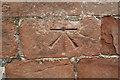 NY6819 : Benchmark on St Michael's Church by Roger Templeman