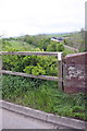 East end of parapet of bridge for B6542 over former railway