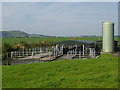 Cattle pens and silo at Cumrue Farm