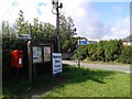 Village notice board and road signs near Knockerhill wood