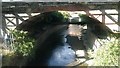 River Ravensbourne passing below the railway, Lewisham station