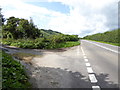 Looking west on Amberley Road across junction with lane