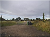 TL1616 : Field and farm entrance on The Slype by David Howard