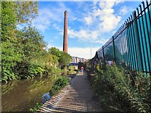 SJ9398 : Ashton Canal and Junction Mill chimney by Gerald England