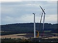 SE4206 : In failing light the wind turbine blades are installed #3 by Steve  Fareham