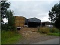 SP4959 : Barns at Northfields Farm by Bikeboy