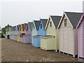 Colourful beach huts at eastern end of West Mersea