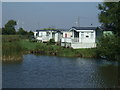 Caravan park beside fishing pond